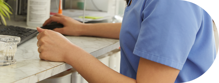 Healthcare officer looking at data on the computer