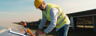 Electrician working on solar panels