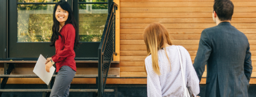 Real estate agent showing a house to a couple